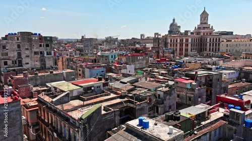 Cuba Havana v26 Very low birdseye of colorful rooftop neighborhood view with Capitol dome in background 4/18