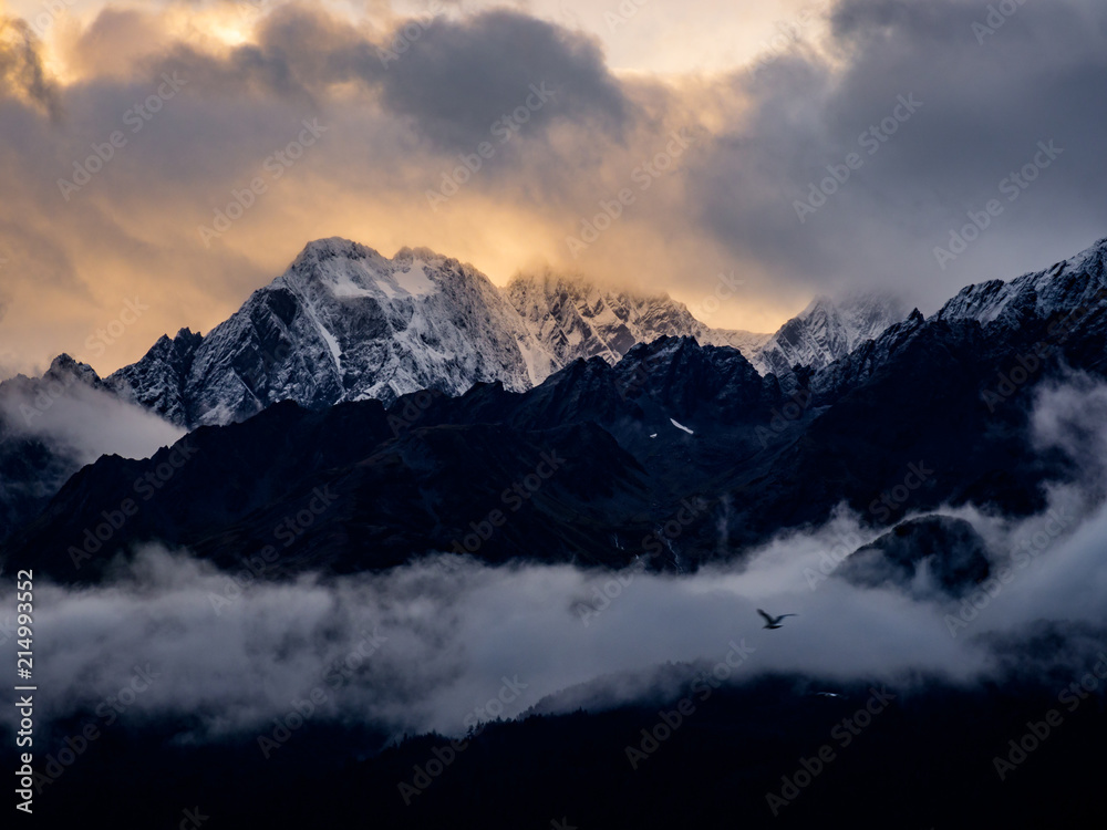 Sunrise over Snowcapped Mountain Peaks, Full Frame Sunrise over Snowcapped Mountain Peaks, Full Frame