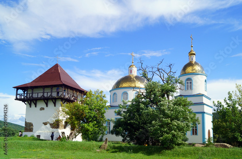 Obraz na płótnie Orthodox Church and restored tower of ancient fortress in medieval village Busha, Vinnytsia Oblast, Ukraine. w salonie
