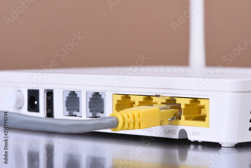 Network router with ethernet cable close up