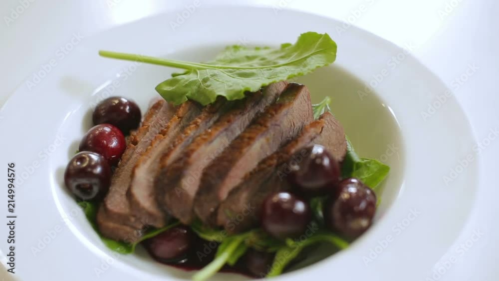 Duck breast with cherries - dish presentation Duck breast with cherries - dish presentation