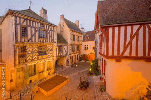 Принти на полотні Square with half-timbered houses, in the medieval village Noyers-sur-Serein