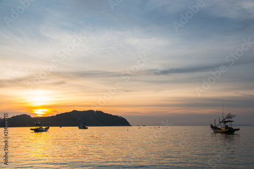 Fishermen boat at sunset near Koh Phangan island  Thailand