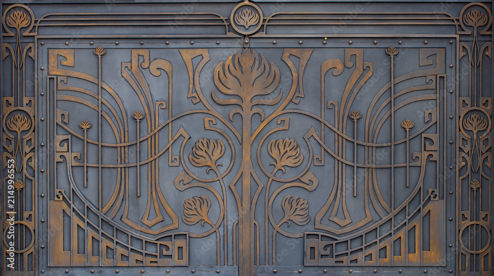 ornate wrought-iron elements of metal gate decoration