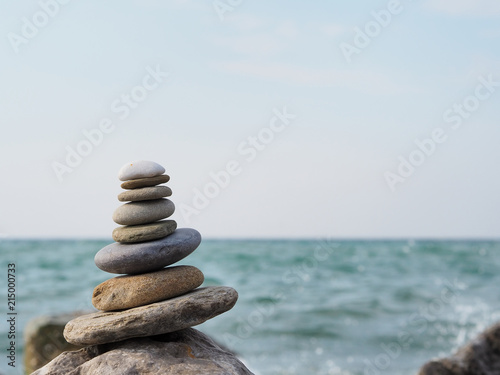 tower and blur background made of stones by the sea