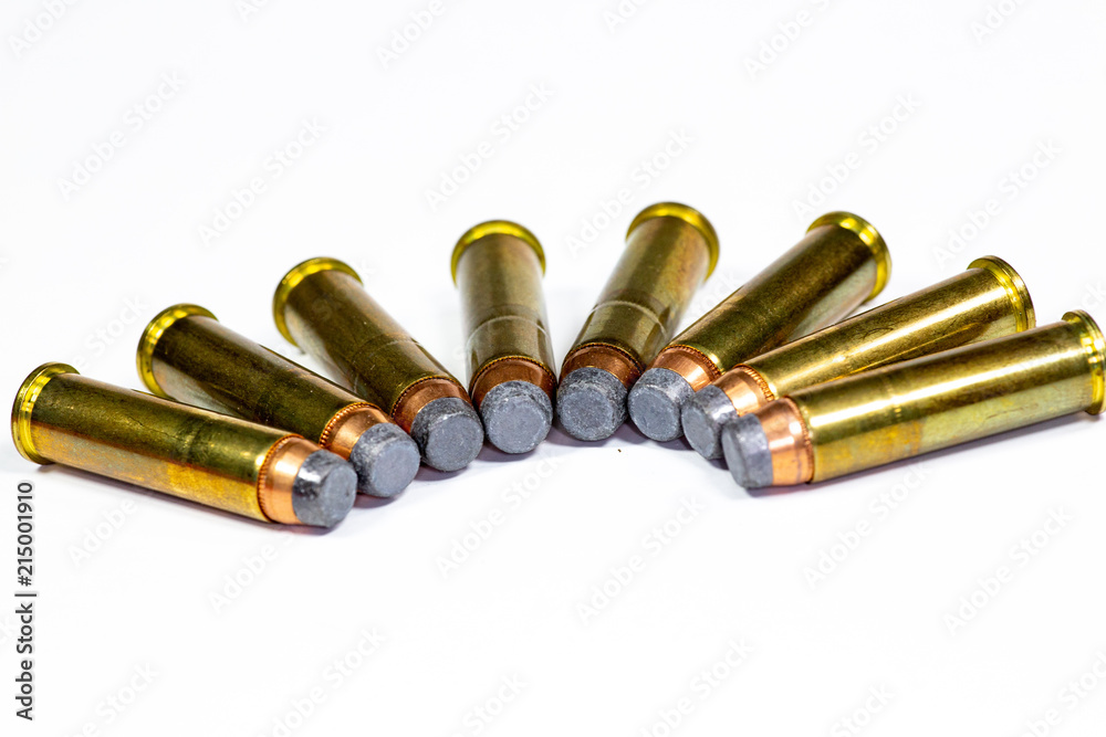 357 Magnum bullets laying on a white counter 357 Magnum bullets laying on a white counter
