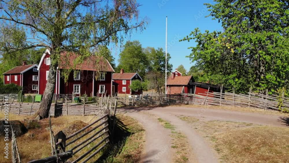 Panning footage of typical old Swedish village environment in Stensjo, Smaland