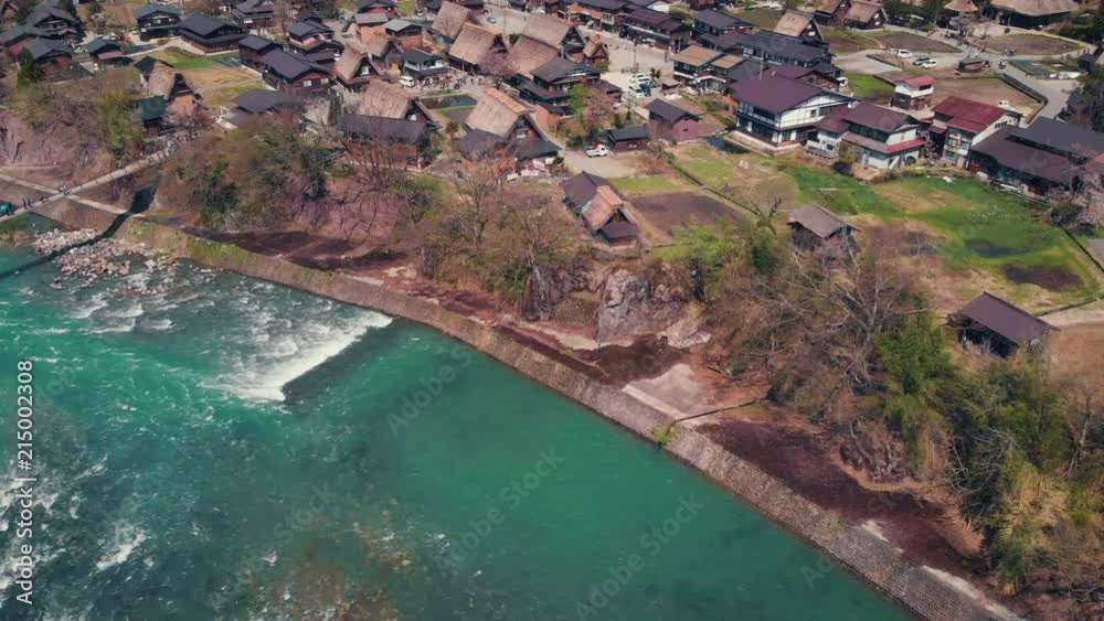 Flying over the Shogawa River and Shirakawa-go village in the Japanese Alps. Flying over the Shogawa River and Shirakawa-go village in the Japanese Alps.