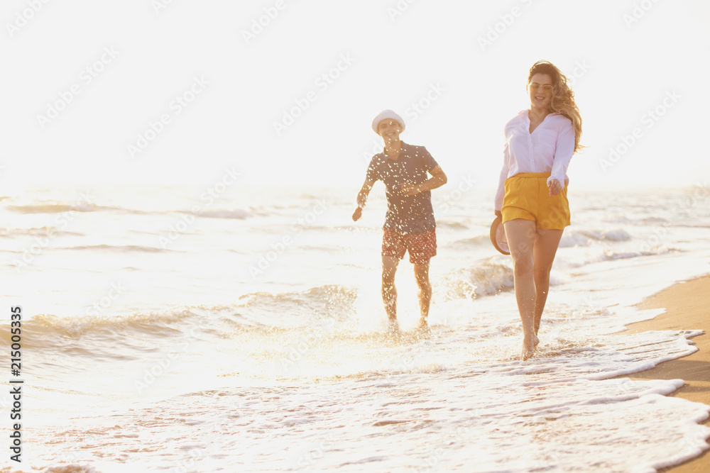 Beach of summer time and two lovers