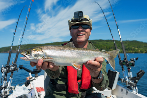 Summer arctic trout fishing trophy