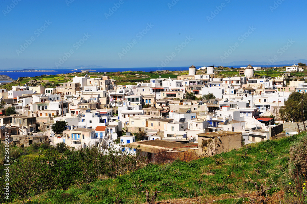 Byblos white village with aegean sea on horizon