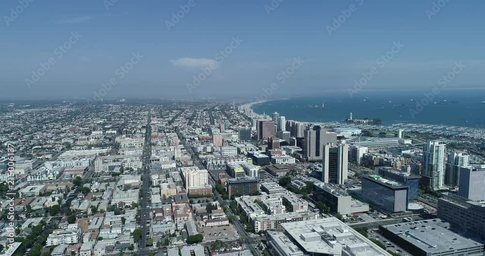 Aerial view of the Long Beach skyline with the coast in the distance. Aerial view of the Long Beach skyline with the coast in the distance.