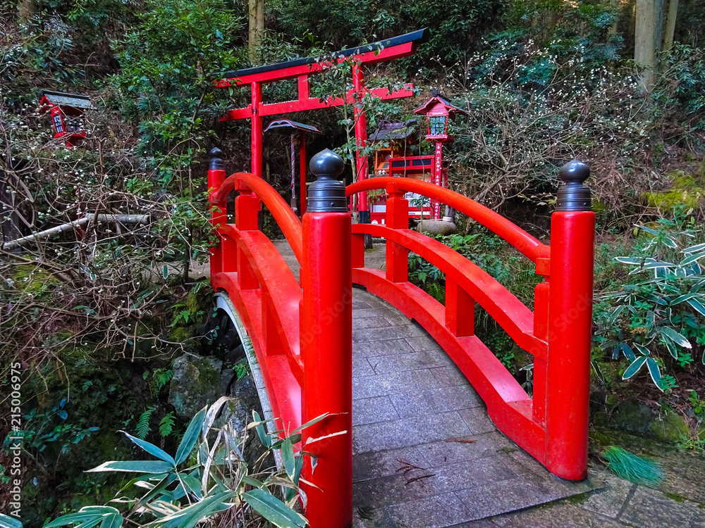 A Small Red Arch Bridge and A Small Waterfall A Small Red Arch Bridge and A Small Waterfall