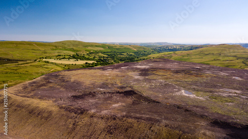 Aerial drone view of a large, buried landfill dump site in Wales photo