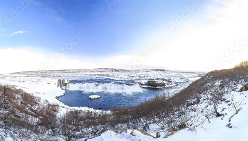 Faxafoss waterfalls along the Golden Circle route in snowy Winter Iceland