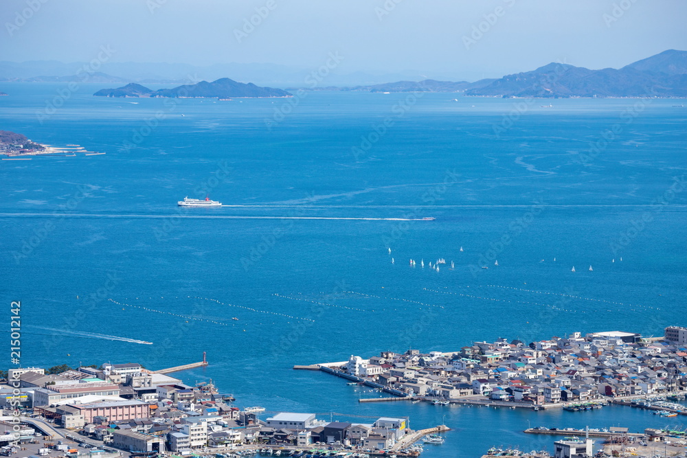 Landscape of the Seto Inland Sea(islands,port,ferry,yachts and city),Shikoku,Japan