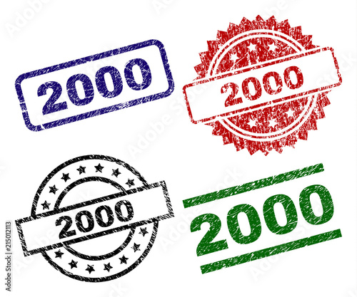 2000 seal prints with corroded surface. Black, green,red,blue vector rubber prints of 2000 caption with corroded texture. Rubber seals with round, rectangle, medal shapes.