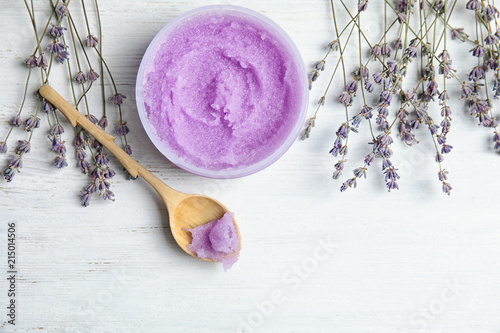 Fototapeta Naklejka Na Ścianę i Meble -  Flat lay composition with lavender flowers and natural cosmetic on wooden background