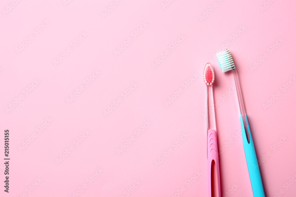Manual toothbrushes on color background. Dental care Manual toothbrushes on color background. Dental care