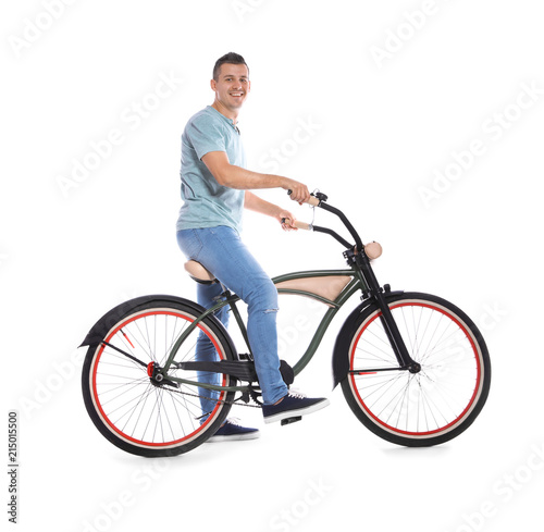 Portrait of handsome man with bicycle on white background