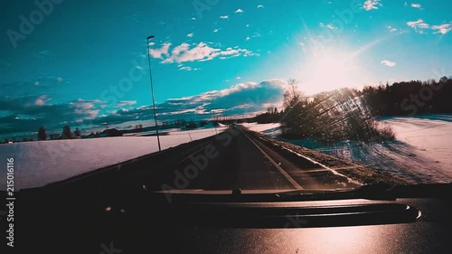 Driving into sunset in Elverum, Norway. photo