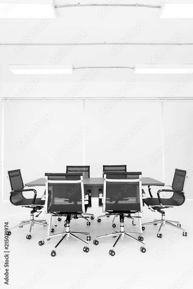 Group of chaira around table in meeting room Group of chaira around table in meeting room