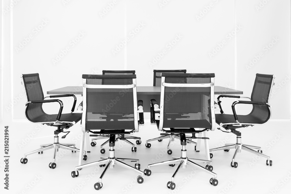 Group of chaira around table in meeting room Group of chaira around table in meeting room