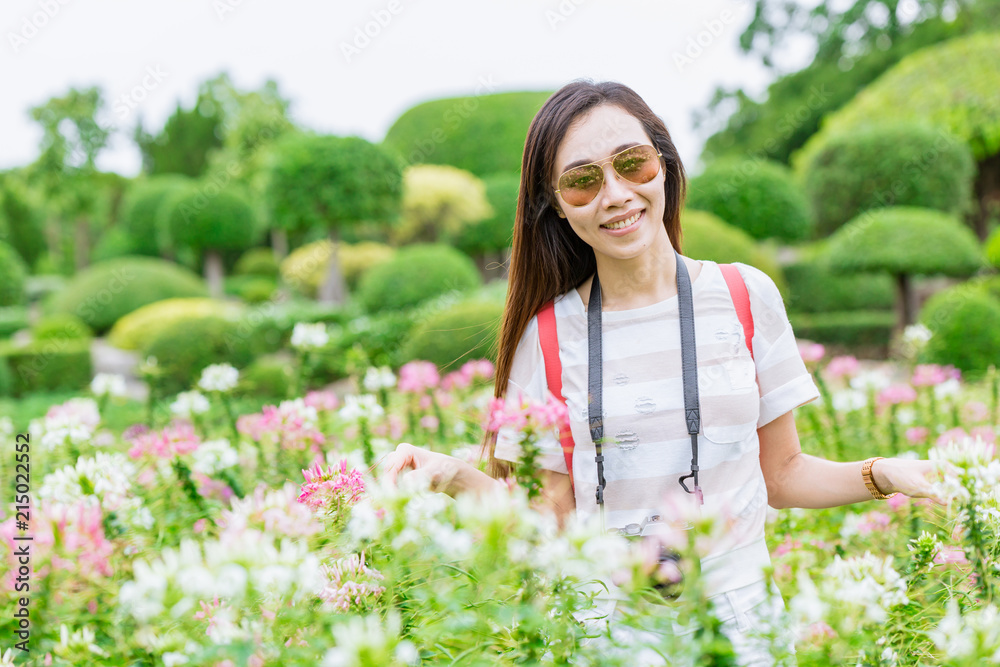 Φωτογραφία Asian teen travel in the green park garden relax in summer holiday