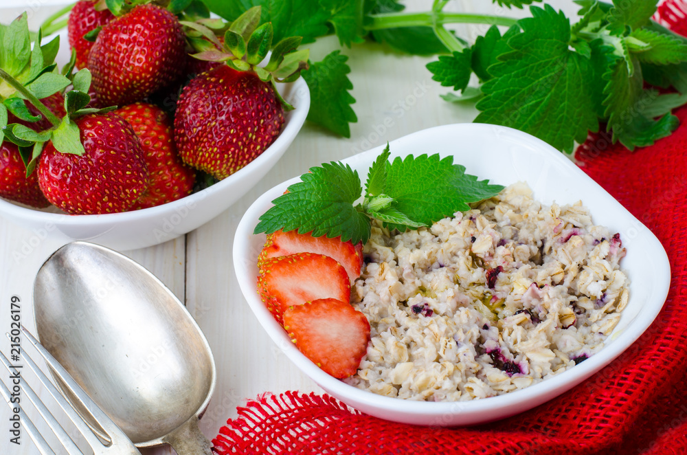 Porridge from oat flakes, strawberries, mint Porridge from oat flakes, strawberries, mint