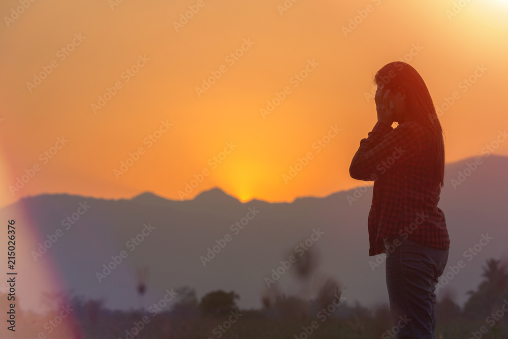 Ταπετσαρία Worried teenager woman covering her face with hands at sunset time
