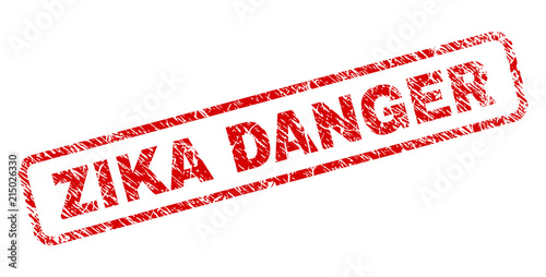 ZIKA DANGER stamp seal print with scratced style. Red vector rubber print of ZIKA DANGER tag with grunge texture. Text caption is placed inside rounded rectangle frame.