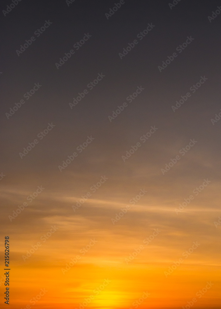 Beautiful Orange Sunset with Shadows Cast by Clouds Beautiful Orange Sunset with Shadows Cast by Clouds