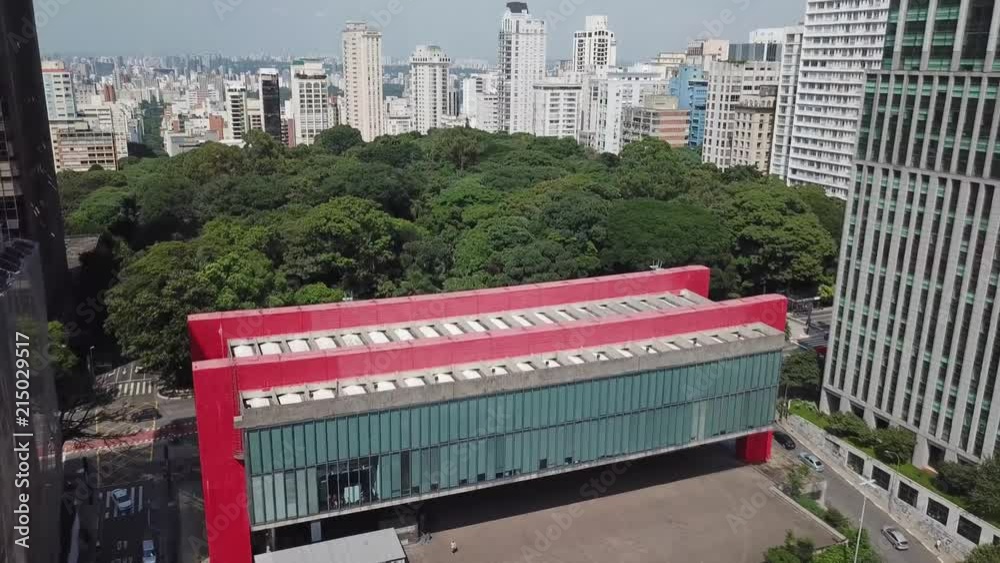 Drone shot of Masp museum with buildings and park in background, Av. Paulista, Sao Paolo