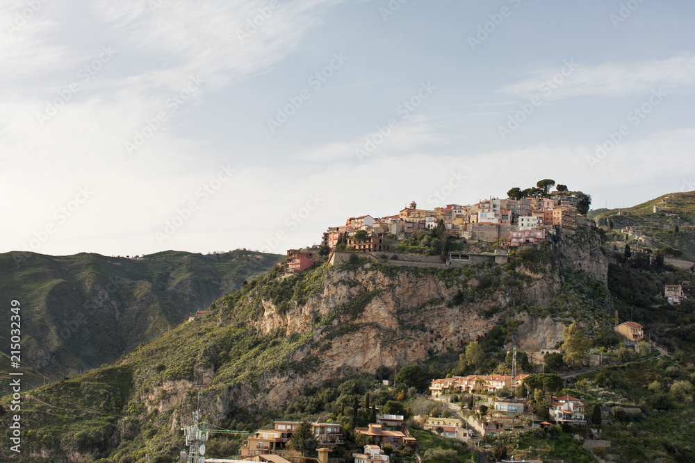 Wide view of Castelmola, scenic village above Taormina, Sicily, Italy