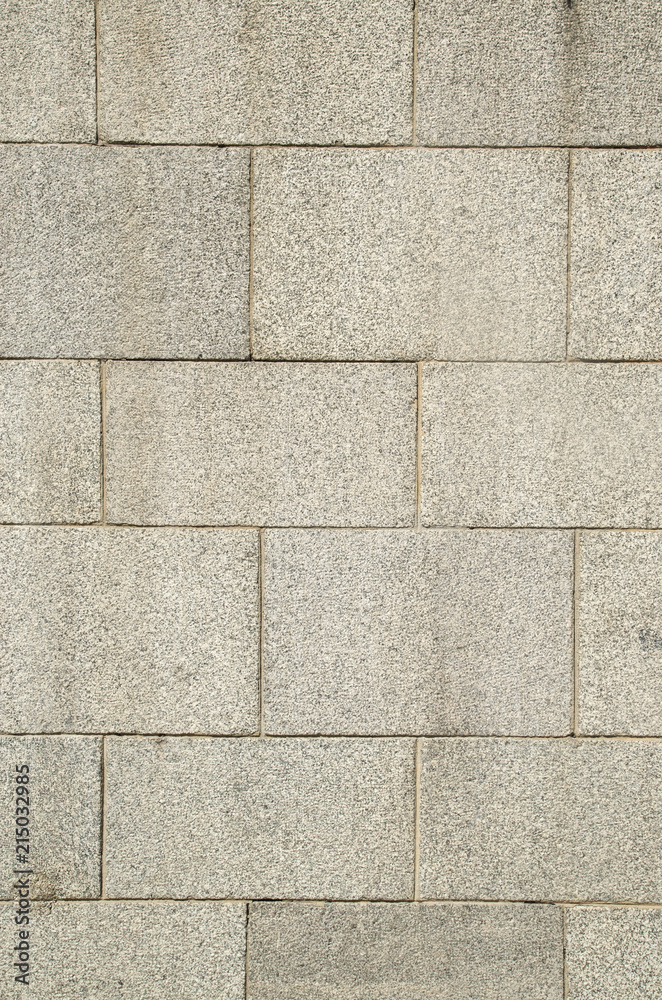Fototapeta premium New stone wall of large granite blocks