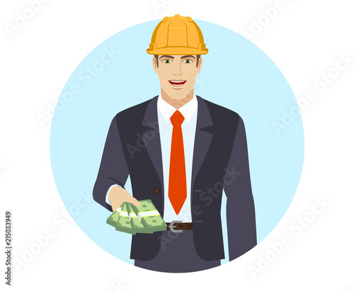 Businessman in construction helmet with money