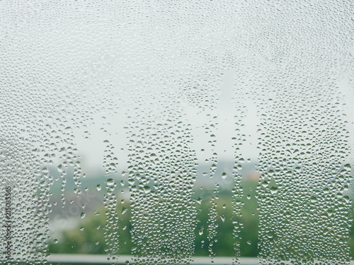 Water droplets on a cold window pane