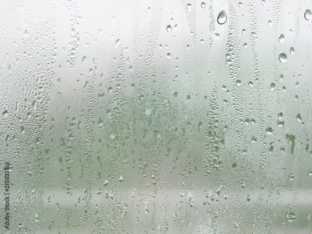 Water droplets on a cold window pane