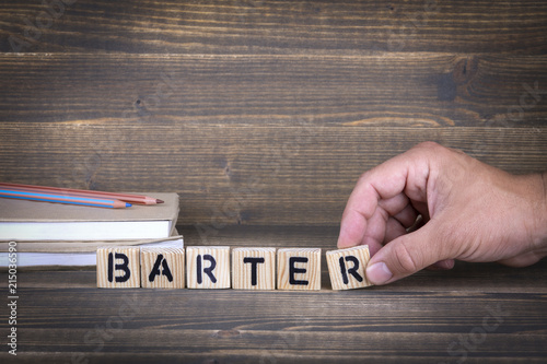 Barter concept. Wooden letters on the office desk, informative and communication background