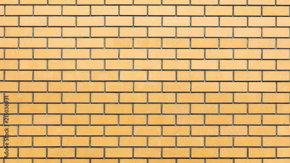 Yellow bricks in the wall as an abstract background Yellow bricks in the wall as an abstract background