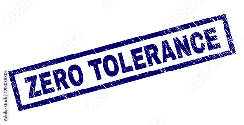 Rectangle ZERO TOLERANCE seal print with corroded texture. Rubber seal imitation has rectangular frame. Blue vector rubber print of ZERO TOLERANCE label with dust texture.