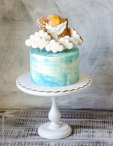 baptizing blue cream cake with gingerbread cookies