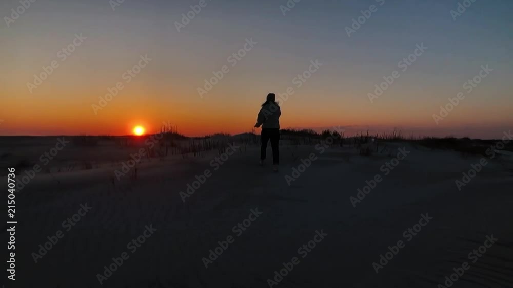 Woman Walks Into Sunset on Beach Alone Slow Motion Woman Walks Into Sunset on Beach Alone Slow Motion