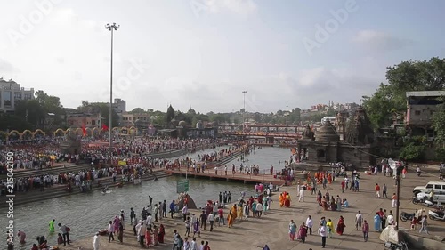 Overlooking a mass gathering of humans for Kumbh Mela at Nashik.
Crowd gathering for a religious event. photo
