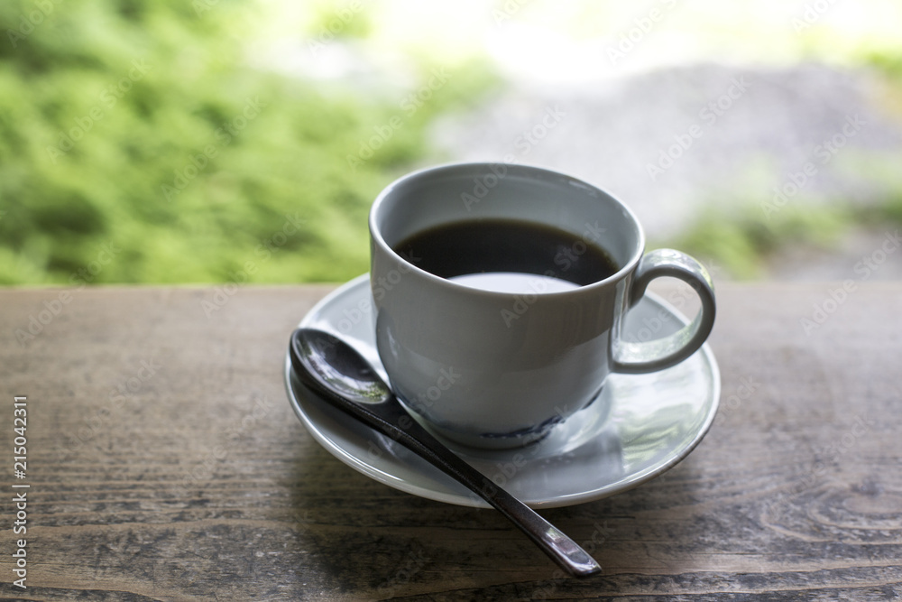 Espresso Coffee cup on wood table in cafe Espresso Coffee cup on wood table in cafe