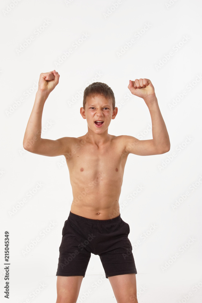 teenager with muscles. emotions of the winner. teenager with muscles. emotions of the winner.