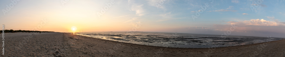 Fototapeta premium north sea sunset with beach panorama