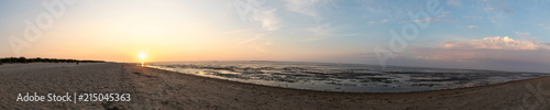 north sea sunset with beach panorama