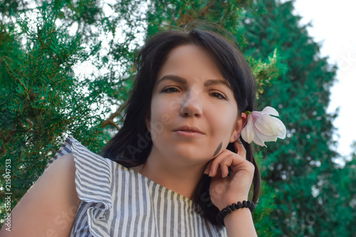 Beautiful brunette with different eye color heterochromia 