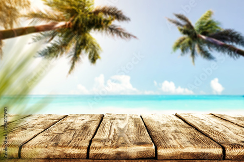 Table background and sea landscape with two palms 